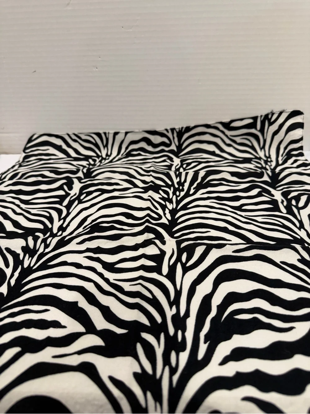 Set of 13 cotton 20x20” Zebra Print Napkins, Black & White, used for a party.